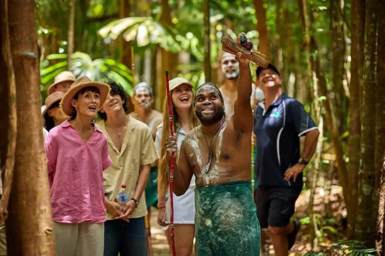A group of tourists with the Dyirribarra Bagirbarra people, touring the Cassowary Coast in Australia