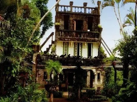 Spanish-inspired castle at Paronella Park surrounded by tropical gardens